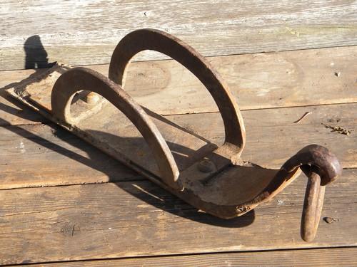 photo of early old auto wheel iron sled or ski w/ hand forged ring Model T vintage #1