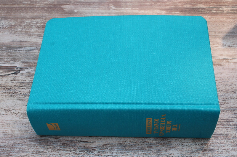 photo of eighth edition Merck Veterinary Manual 1998, large & small animals medical reference book #4