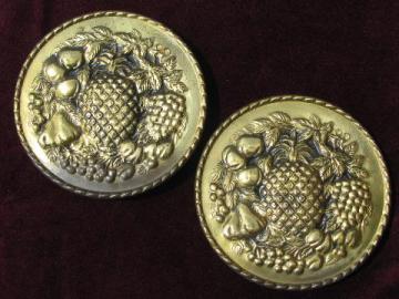 catalog photo of embossed brass chargers, wall pocket plates w/ fruit pattern, vintage England