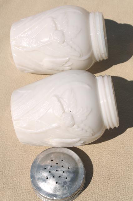 photo of embossed flowers tulip pattern milk glass shakers or spice jars, vintage S&P set #7