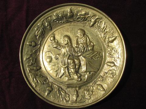 photo of embossed solid brass chargers, old England scenes wall pocket plates #3