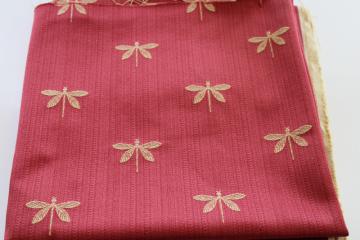 catalog photo of embroidered dragonflies home decor fabric, pale gold insects on rose red sateen