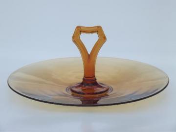 catalog photo of epression era vintage amber glass serving tray plate w/ center handle 