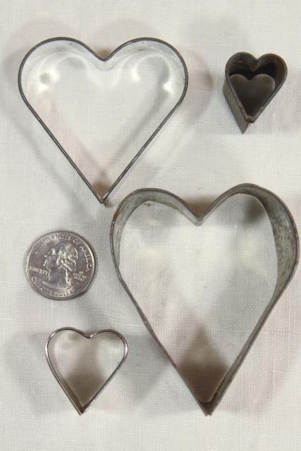 photo of farmhouse kitchen primitive tin hearts, vintage heart shaped cookie cutters & mold #8