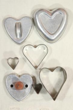 catalog photo of farmhouse kitchen primitive tin hearts, vintage heart shaped cookie cutters & mold
