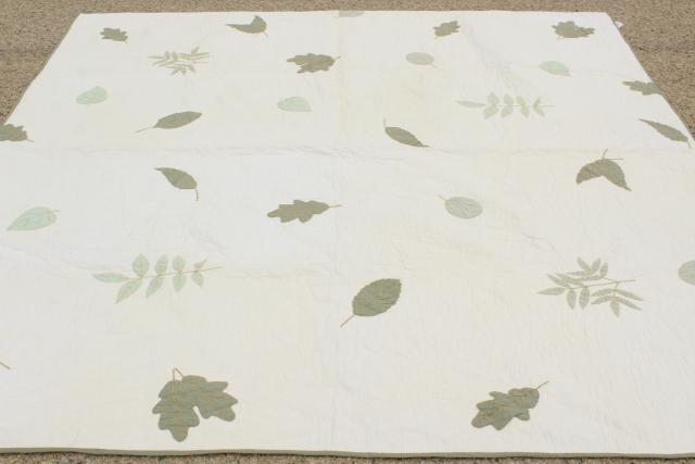 photo of farmhouse style vintage cotton quilt w/ applique leaves, soft natural greens on white #1