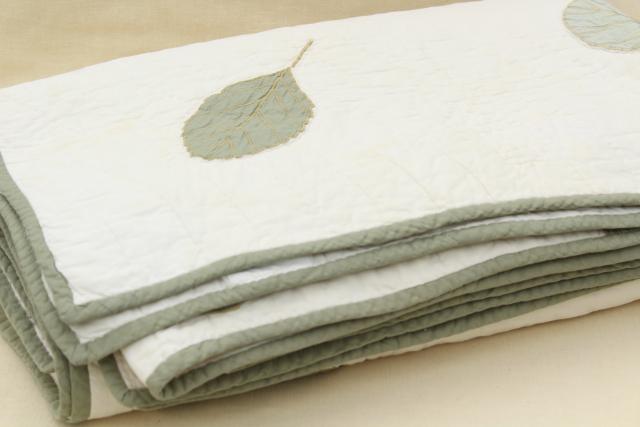 photo of farmhouse style vintage cotton quilt w/ applique leaves, soft natural greens on white #7