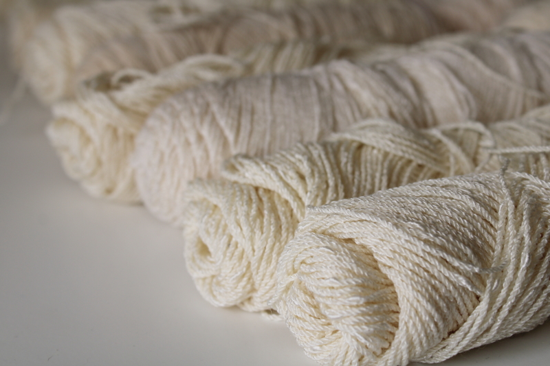 photo of fine boucle texture wool rayon blend yarn, fingering weight Melrose Cravenella ivory white #3