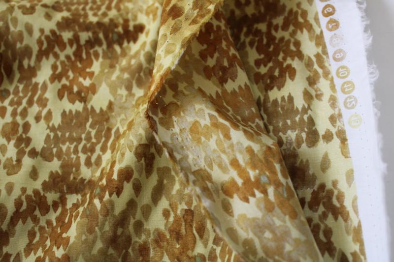 photo of fine cotton lawn fabric, Windham 'flora' print abstract in brown on golden yellow #3