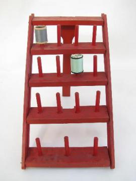 catalog photo of folding wood sewing thread or string spool rack, red paint