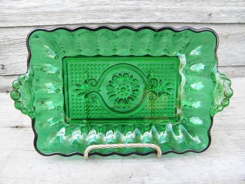 photo of forest green butter plate or celery tray, bead edge sandwich glass #1