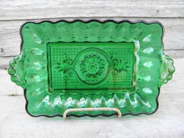 catalog photo of forest green butter plate or celery tray, bead edge sandwich glass