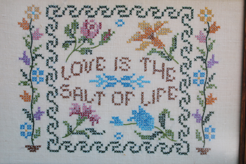 photo of framed vintage cross stitch sampler embroidered on linen Love is the Salt of Life motto #2