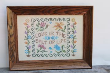catalog photo of framed vintage cross stitch sampler embroidered on linen Love is the Salt of Life motto 