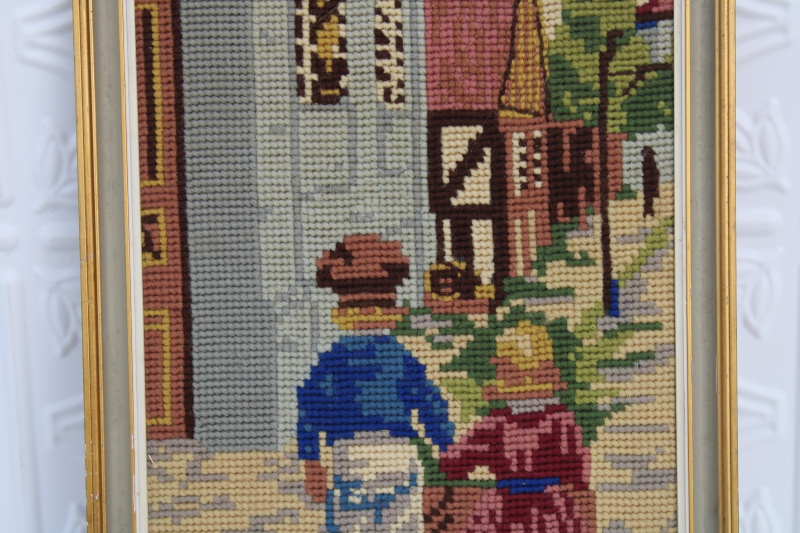 photo of framed vintage needlepoint, old world Dutch or French street scene w/ boy girl #2