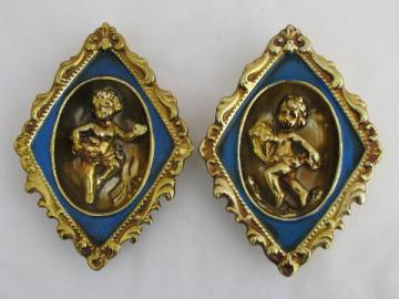 catalog photo of french blue & gold china cherubs wall plaques, vintage hollywood regency