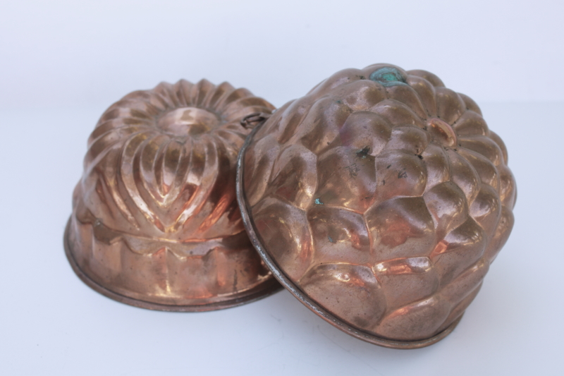 photo of french country style vintage copper molds or bundt pans, fluted round flower shapes  #1