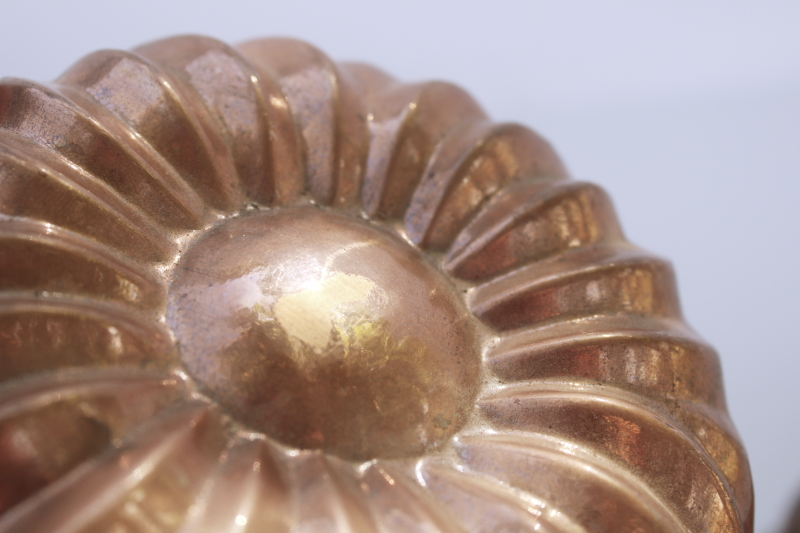 photo of french country style vintage copper molds or bundt pans, fluted round flower shapes  #7