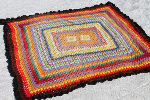 photo of giant crochet granny square afghan in a rainbow of retro colored scrap yarn #1