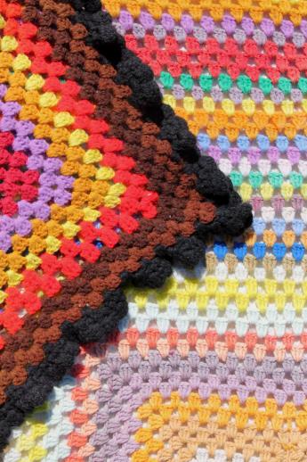 photo of giant crochet granny square afghan in a rainbow of retro colored scrap yarn #3