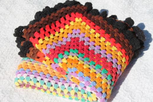 photo of giant crochet granny square afghan in a rainbow of retro colored scrap yarn #5