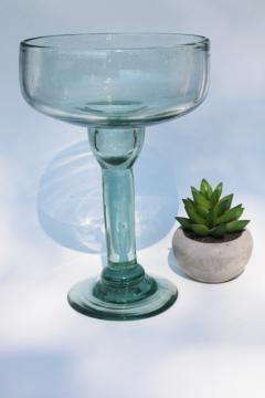 catalog photo of giant oversized margarita glass, green recycled hand blown glass cocktail bar decor