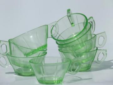 catalog photo of green depression glass tea cups, vintage US Glass pinwheel scroll pattern