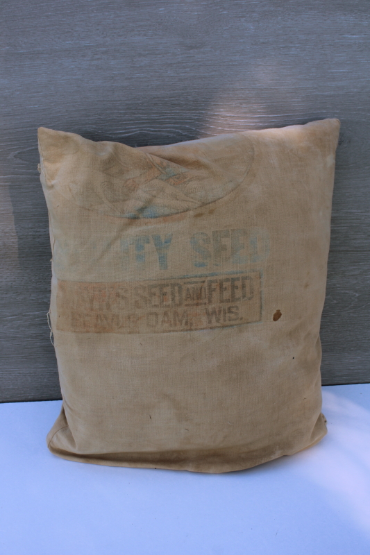 photo of grubby primitive vintage ticking stripe feather pillow w/ old cotton feed sack fabric cover #1