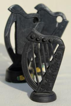 catalog photo of hand carved wooden Irish harps, vintage souvenirs of Ireland, dark peat color wood carvings