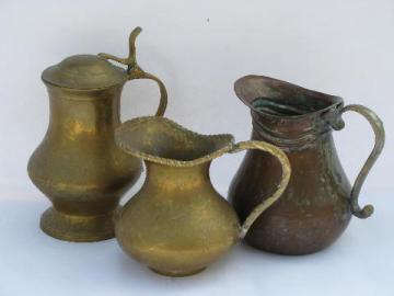 catalog photo of hand crafted vintage metal pitchers, wrought copper, brass pitcher lot