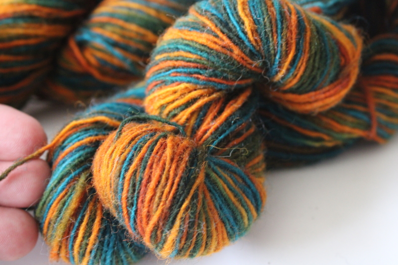 photo of hand dyed & spun wool yarn sunset orange shades w/ turquoise blue & green, three 50 gram hanks  #3
