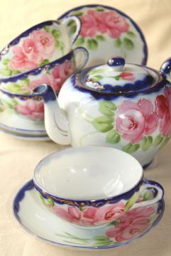 catalog photo of hand painted Nippon porcelain teapot, cups & saucers - antique flow blue china w/ roses