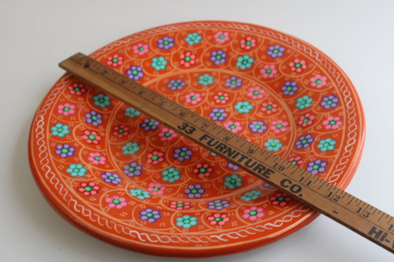 photo of hand painted folk art pottery plate, orange w/ teal green, pink, purple  #7