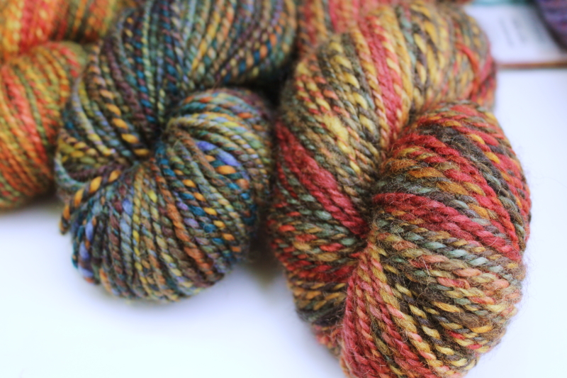 photo of hand spun artist dyed wool yarn lot, four hanks multicolored warm tones w/ gold, fall harvest colors  #3