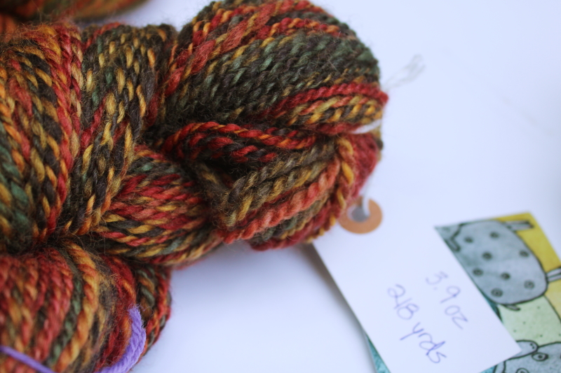 photo of hand spun artist dyed wool yarn lot, four hanks multicolored warm tones w/ gold, fall harvest colors  #8