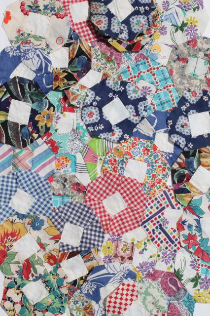 photo of hand stitched vintage patchwork quilt blocks, flower garden motifs in pretty print fabric #1