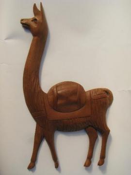 catalog photo of hand-carved South American wood wall hanging plaque, Peruvian llama