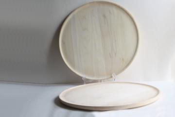 catalog photo of handcrafted natural raw wood trays, Scandinavian modern style blond wood
