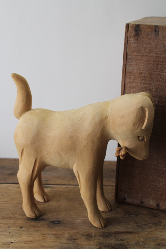 photo of handcrafted wood carving, large figure of a dog, natural rustic unfinished pine hand carved folk art  #1