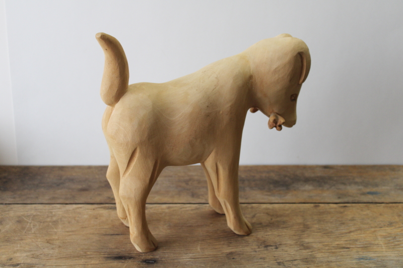 photo of handcrafted wood carving, large figure of a dog, natural rustic unfinished pine hand carved folk art  #6