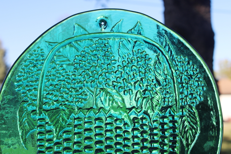 photo of handmade glass suncatcher, teal green pressed glass plate, Nantucket basket of flowers #1