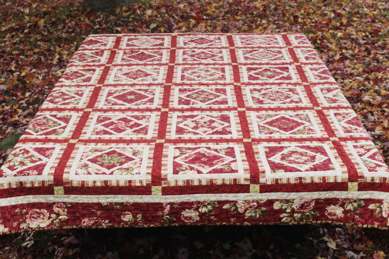 photo of handmade pieced patchwork diamond blocks quilt, full or queen size bedspread rust red roses  #1