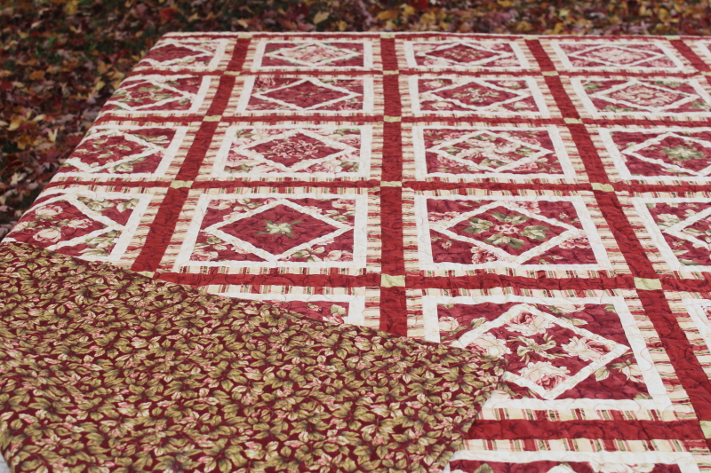 photo of handmade pieced patchwork diamond blocks quilt, full or queen size bedspread rust red roses  #8