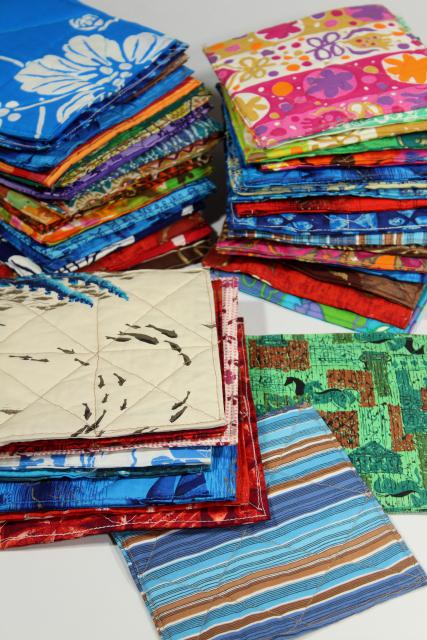 photo of handmade quilted square hot mat pads or pot holders, bright print cotton fabric #1