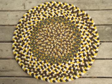 catalog photo of handmade vintage braided wool rug, round floor mat in gold & green wool