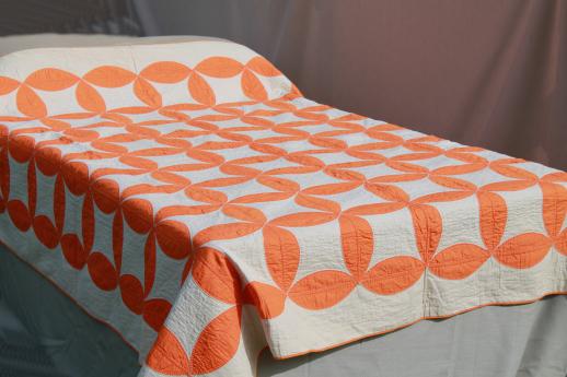 photo of hand-stitched vintage cotton quilt, circle star quilt in orange & white #1