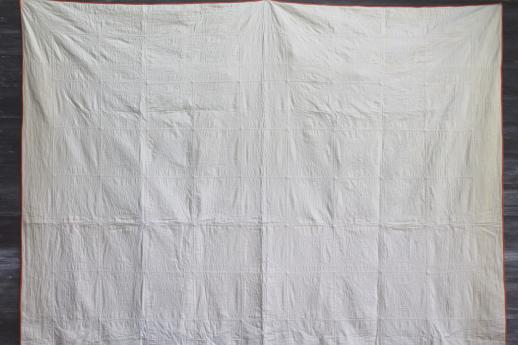 photo of hand-stitched vintage cotton quilt, circle star quilt in orange & white #2