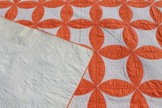 photo of hand-stitched vintage cotton quilt, circle star quilt in orange & white #5