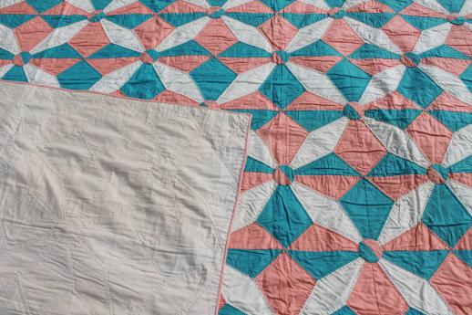 photo of hand-stitched vintage cotton quilt, pinwheel star quilt in apricot & aqua #4