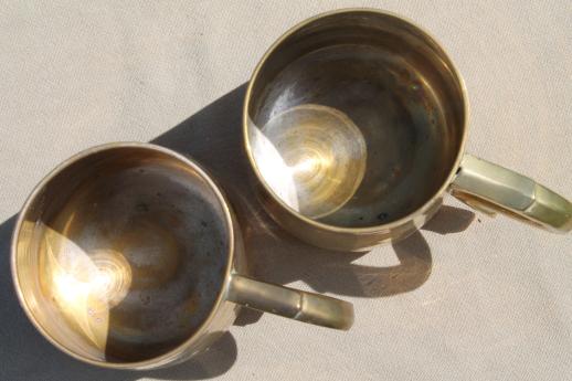 photo of heavy brass beer steins or tankards, vintage cider mugs or tavern cups #4